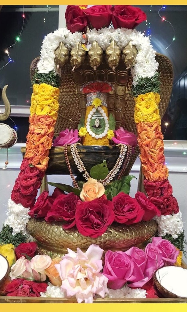 Shiva lingam adorned with flowers