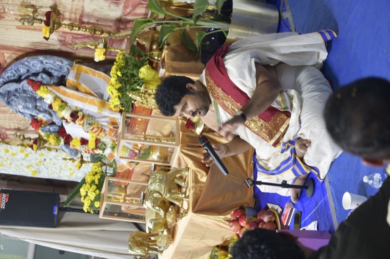 Priest performing pooja at mandapam