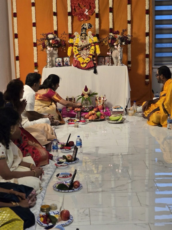 Family pooja with priest