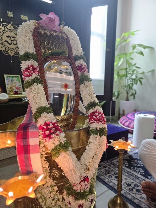 Shiva Lingam with floral decoration