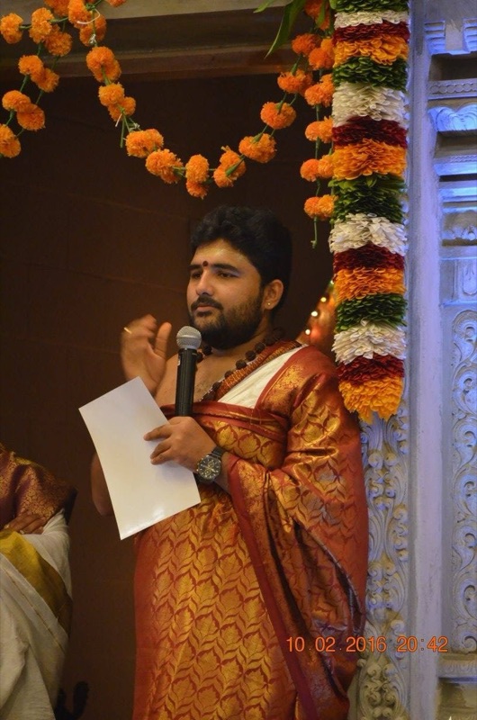 Pandit speaking at temple event